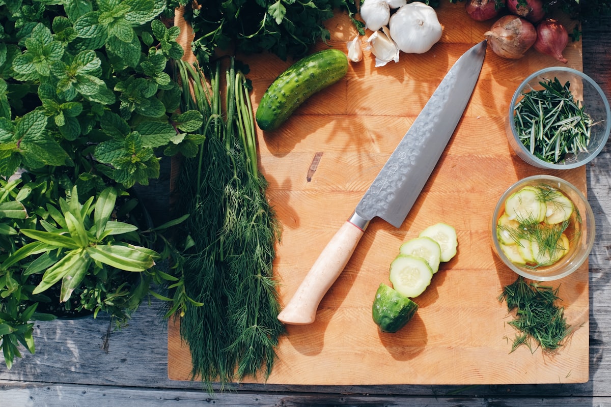 Instructors preparing and teaching healthy recipes in professional kitchen setting